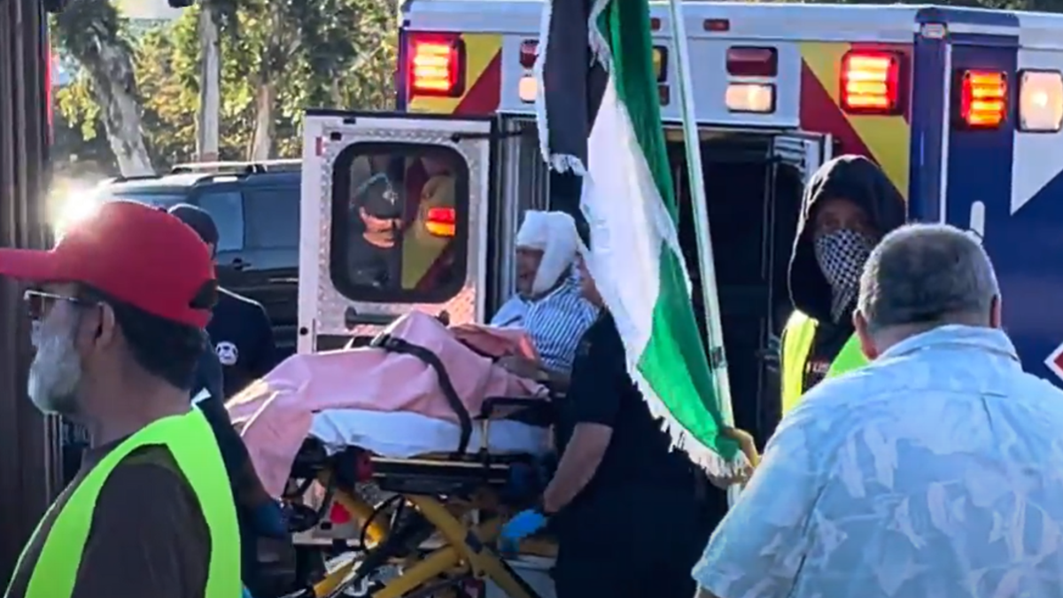 Paul Kessler being loaded into an ambulance