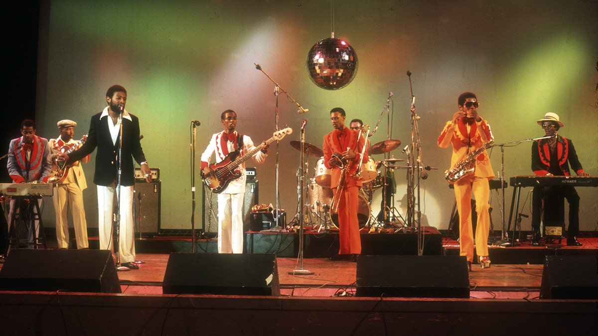 Kool and the Gang play on stage