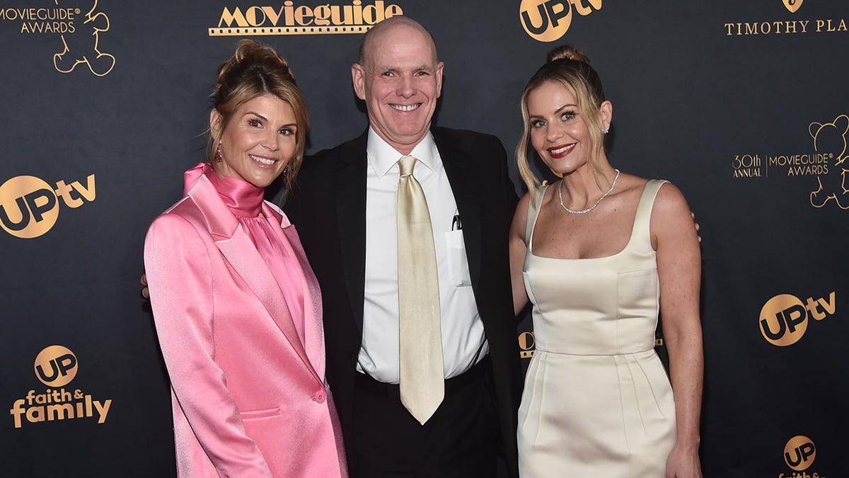 Lori Loughlin, Bill Abbott and Candace Cameron Bure posing together