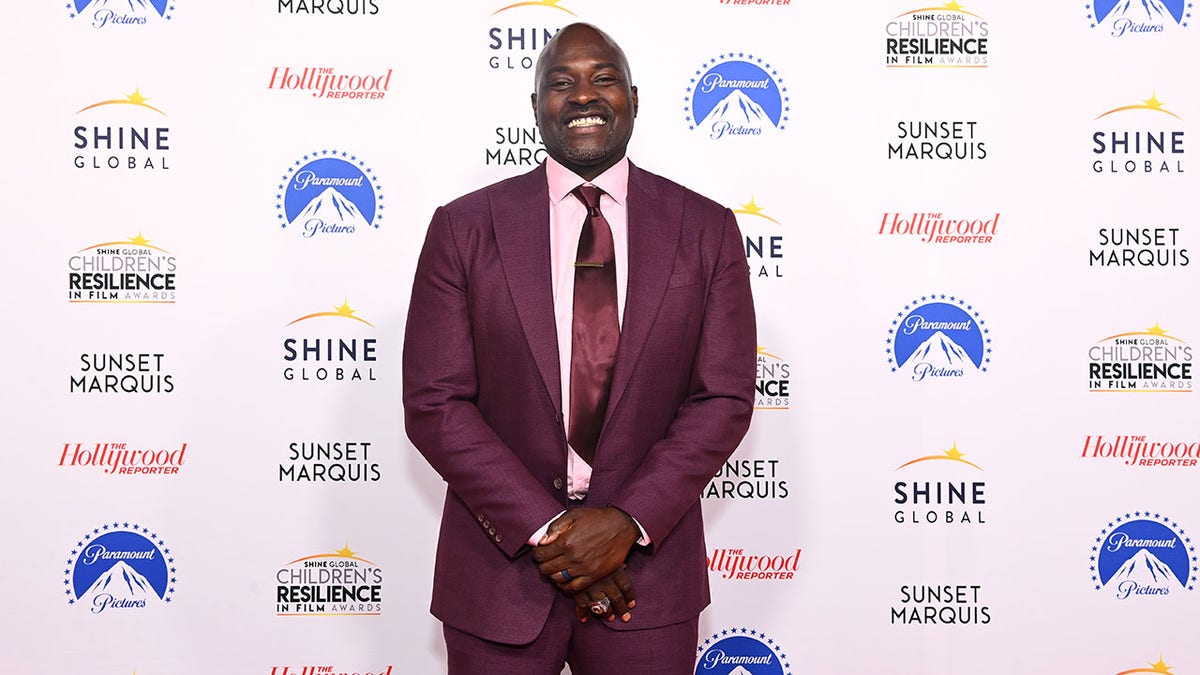 Marcellus Wiley smiles on red carpet