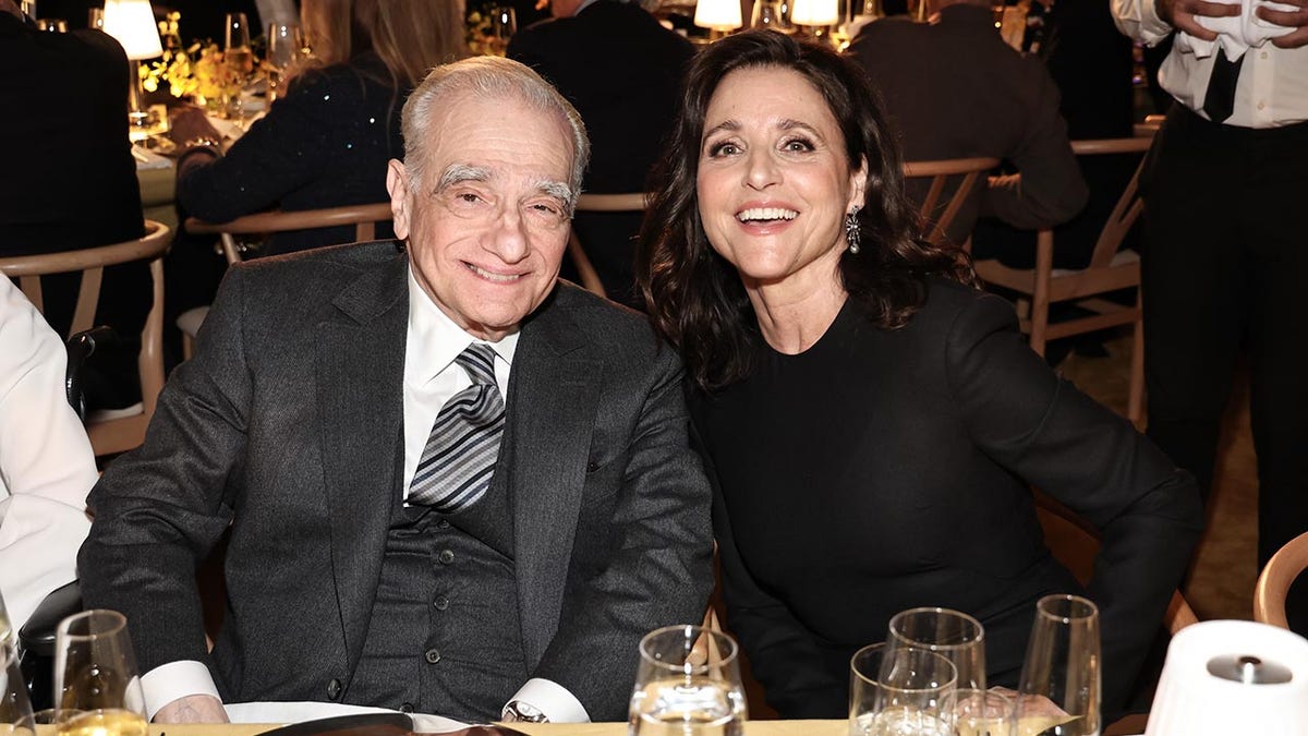 Martin Scorsese and Julia Louis-Dreyfus sitting together