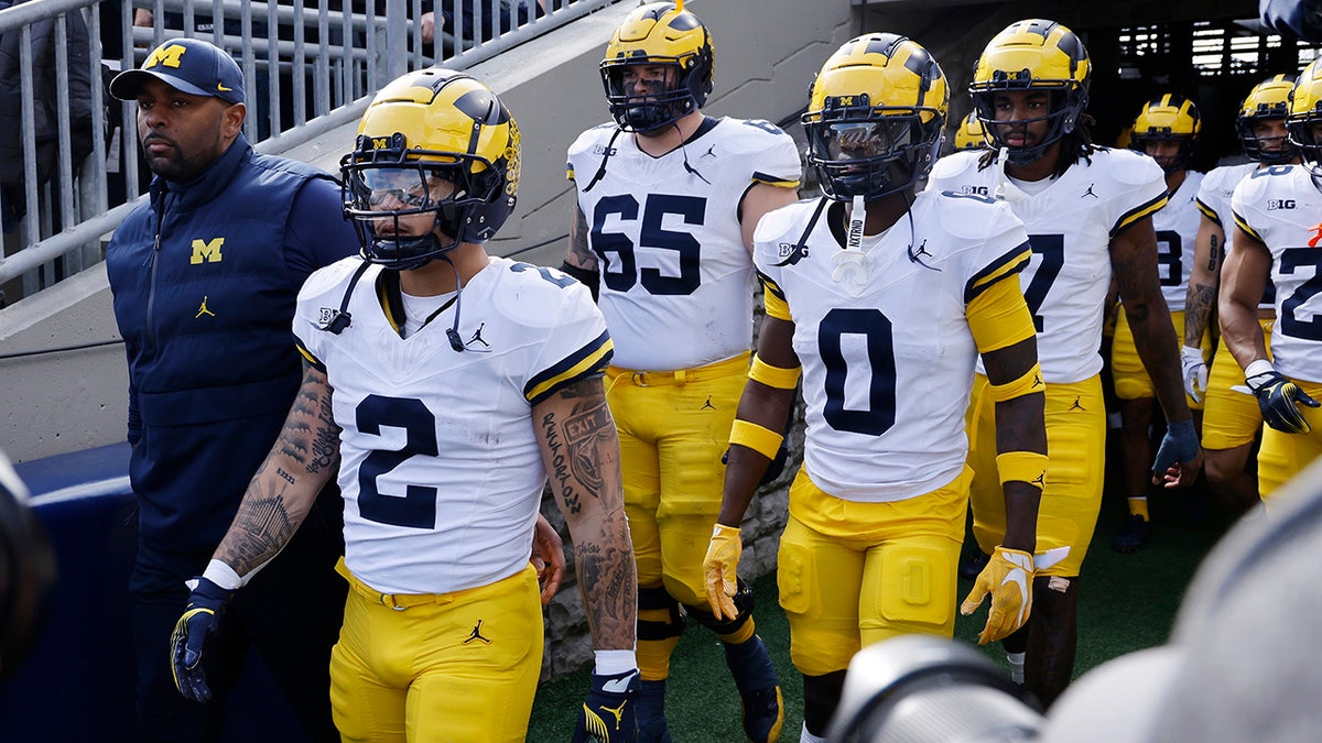 Michigan players walk out