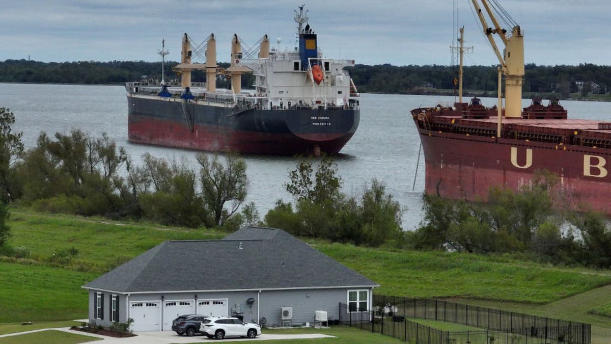 A home in Belle Chasse in Louisiana with two ships in the background