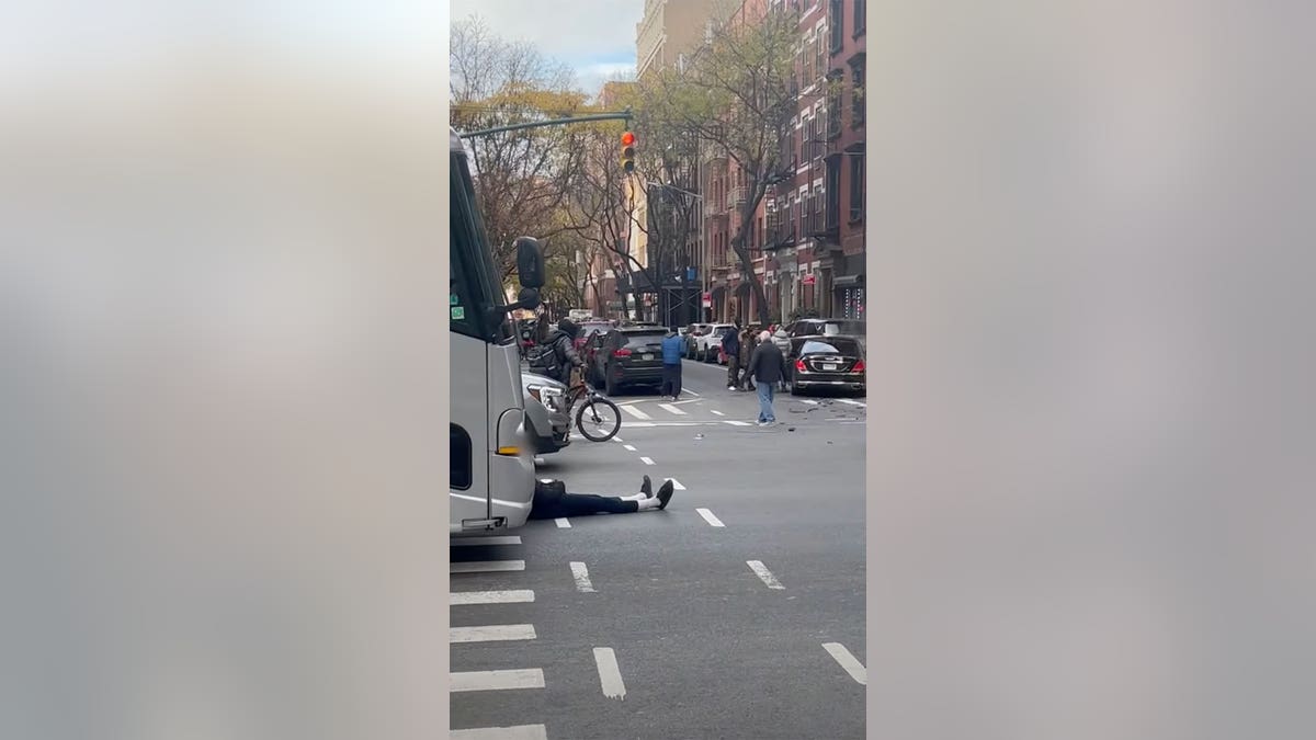 NYC carjacking suspect in front of bus