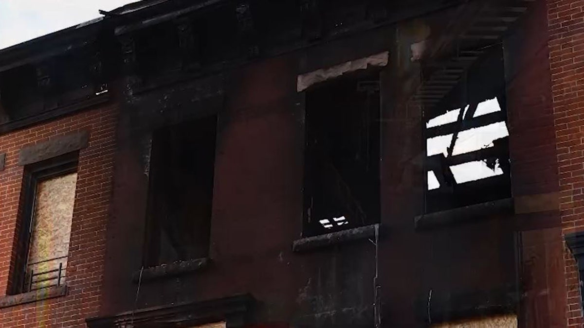 NYC deadly three alarm fire windows