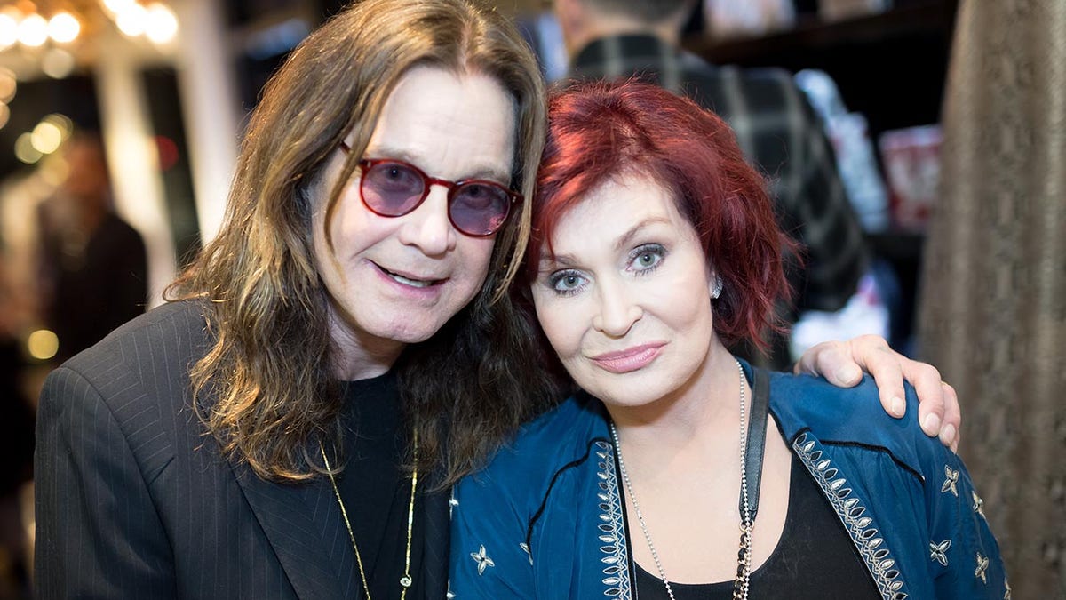 Ozzy and Sharon Osbourne posing together