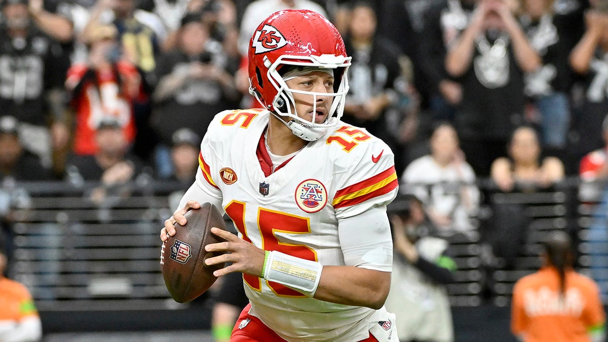 Patrick Mahomes corre