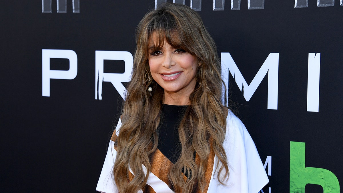 Paula Abdul smiling on the red carpet