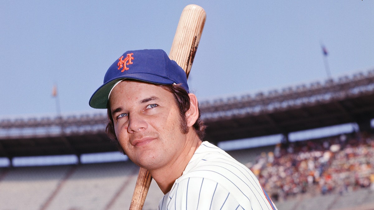 Ron Hodges poses for a picture in his Mets uniform