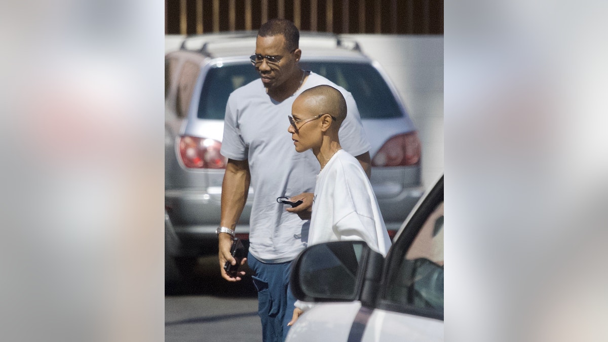 Jada Pinkett Smith and Duane Martin walking together