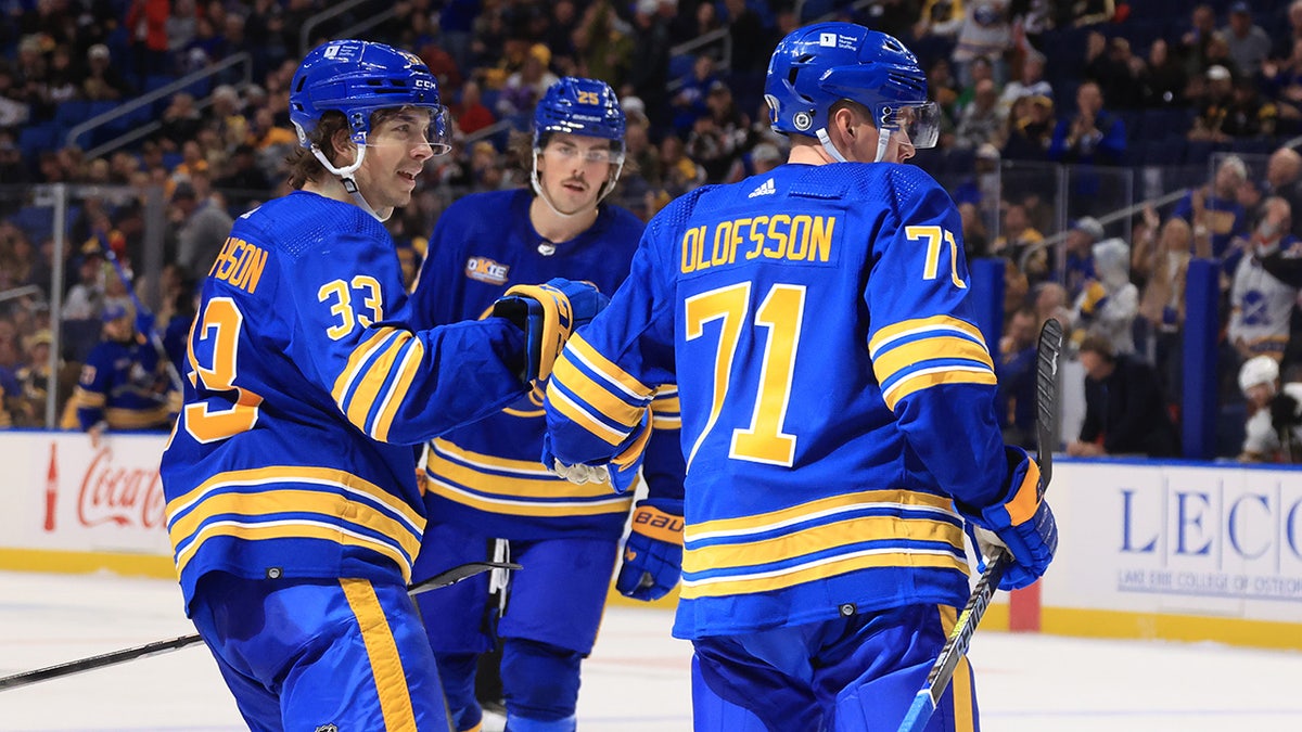 Sabres players celebrate