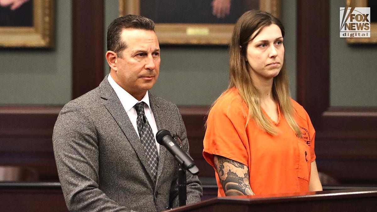 Attorney Jose Baez appears next to his client Shanna Gardner-Fernandez in the Duval County Courthouse