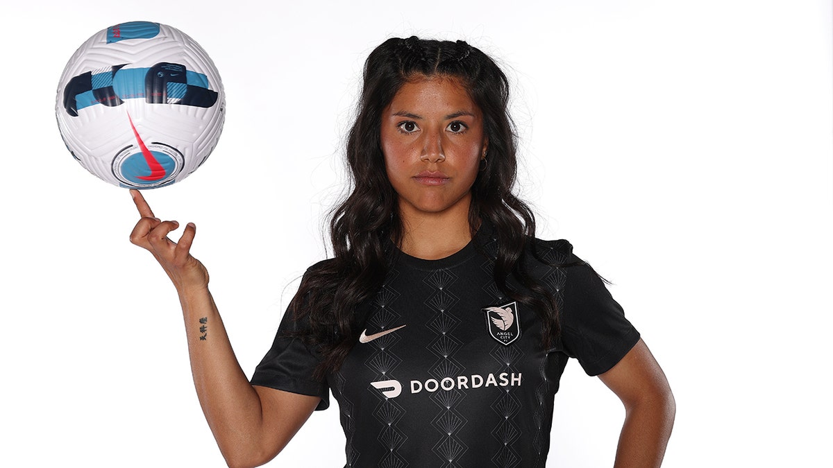 Stefany Ferrer Van Ginkel poses with ball