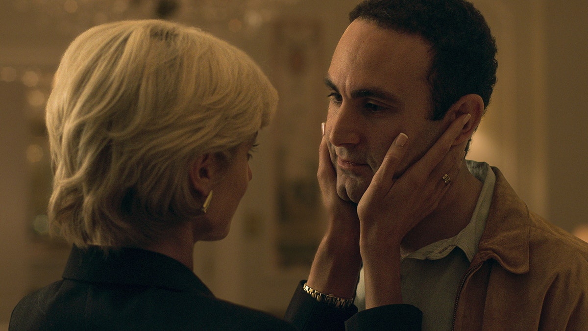 Elizabeth Debecki and Khalid Abdalla in a scene from The Crown