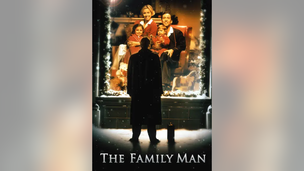Cover of "The Family Man" with man's back as he looks at family