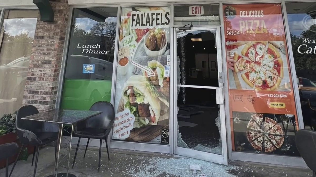 Shattered glass door at Jewish restaurant