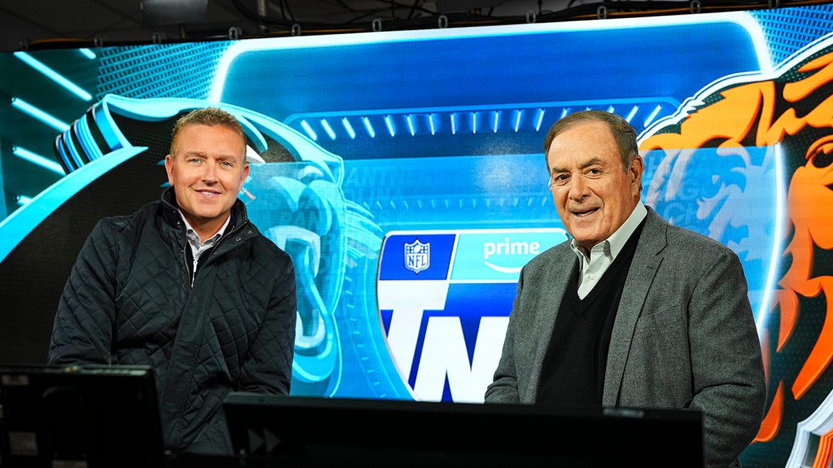 Kirk Herbstreit, left, and Al Michaels are shown in the Amazon Prime TNF broadcast booth, November 9, 2023, in Chicago.