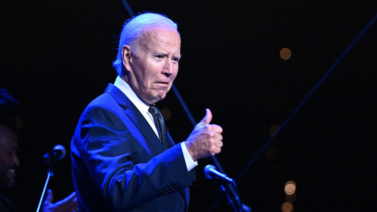 Joe Biden giving a thumbs-up gesture