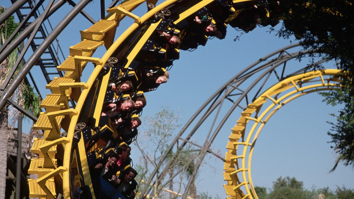 Guests on a roller coaster at Busch Gardens