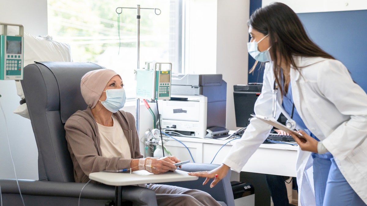 Cancer patient with doctor