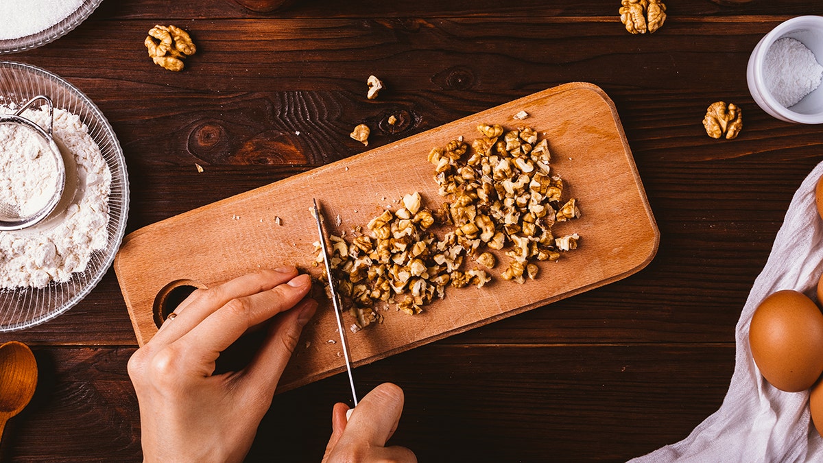 chopping walnuts. for pie