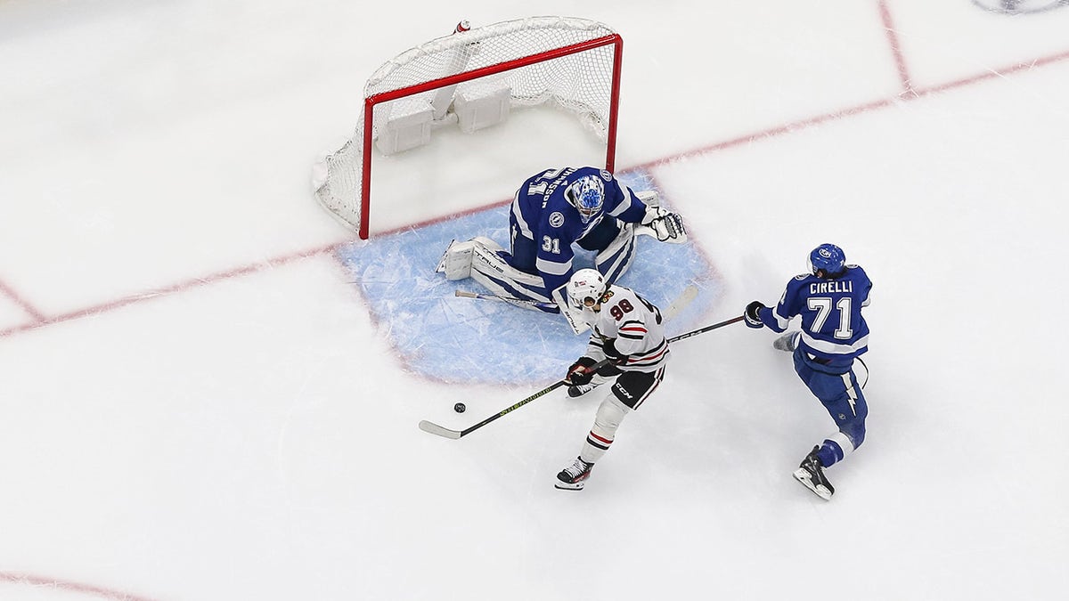 Connor Bedard takes a shot on goal