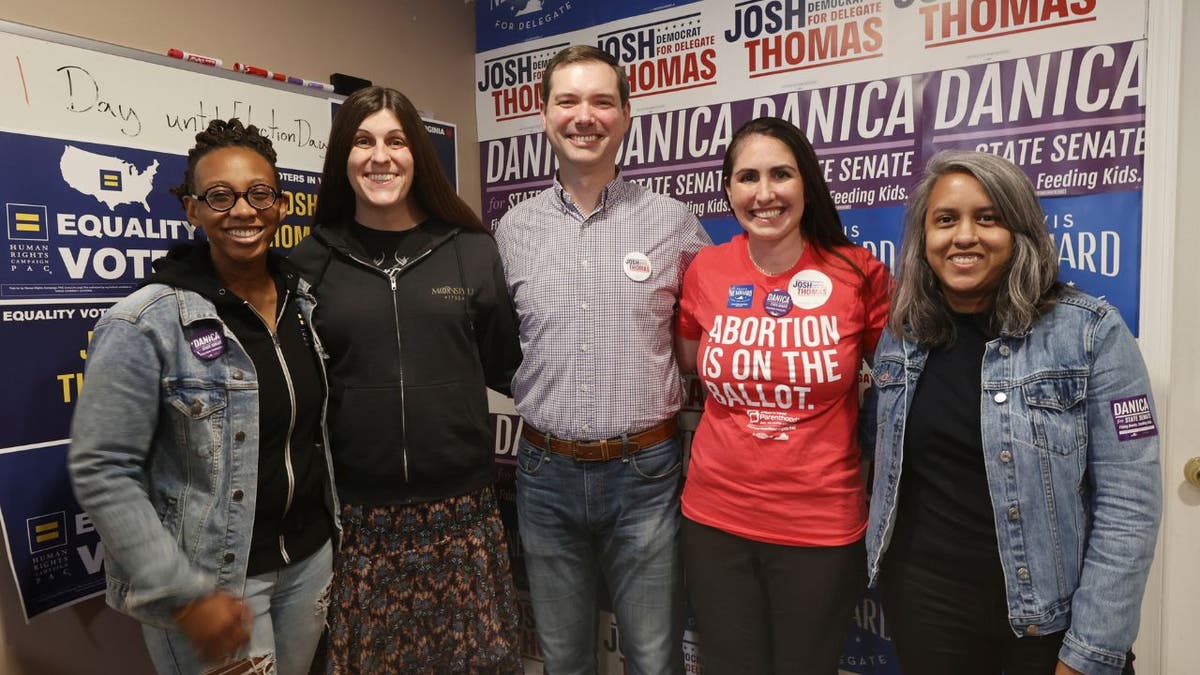 Virginia Democrat Danica Roem posing for a picture with human rights activists