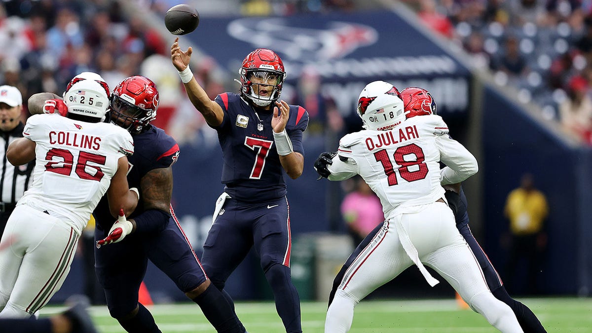CJ Stroud throws ball