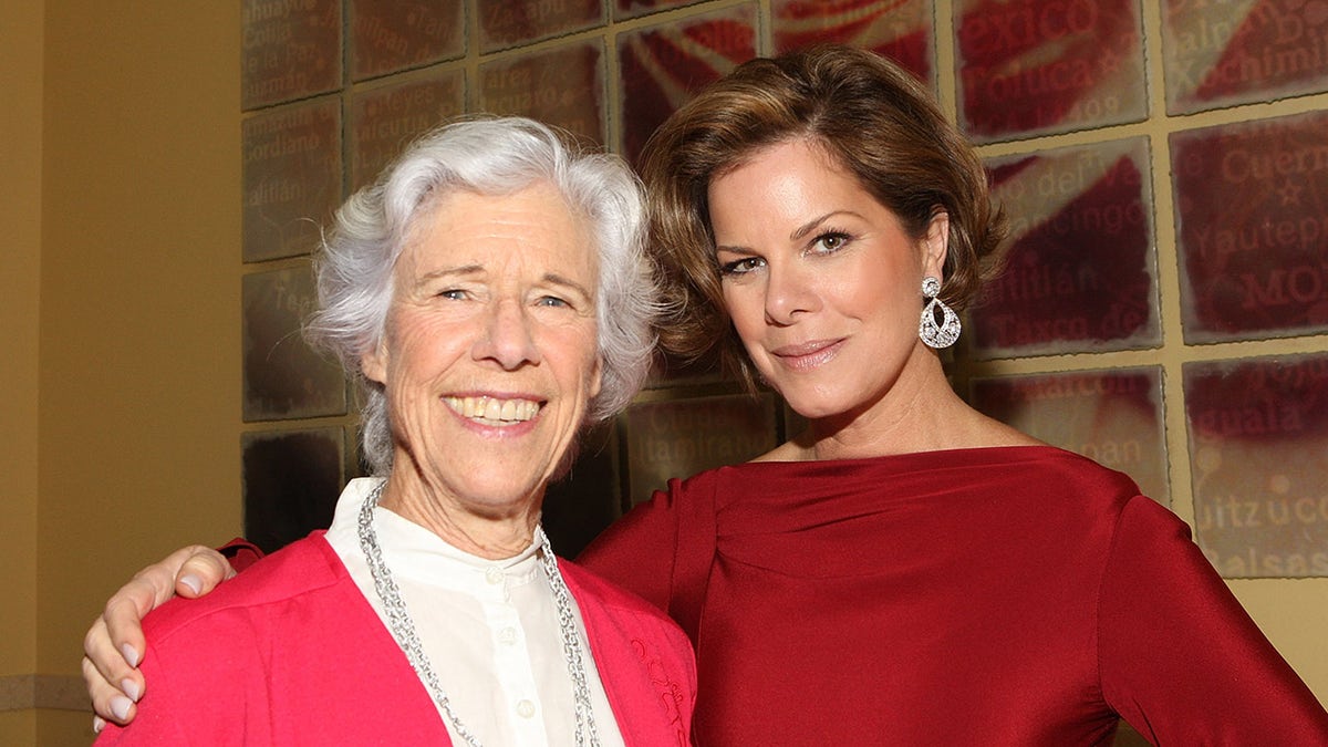 Frances Sternhagen and Marcia Gay Harden embrace at film premiere