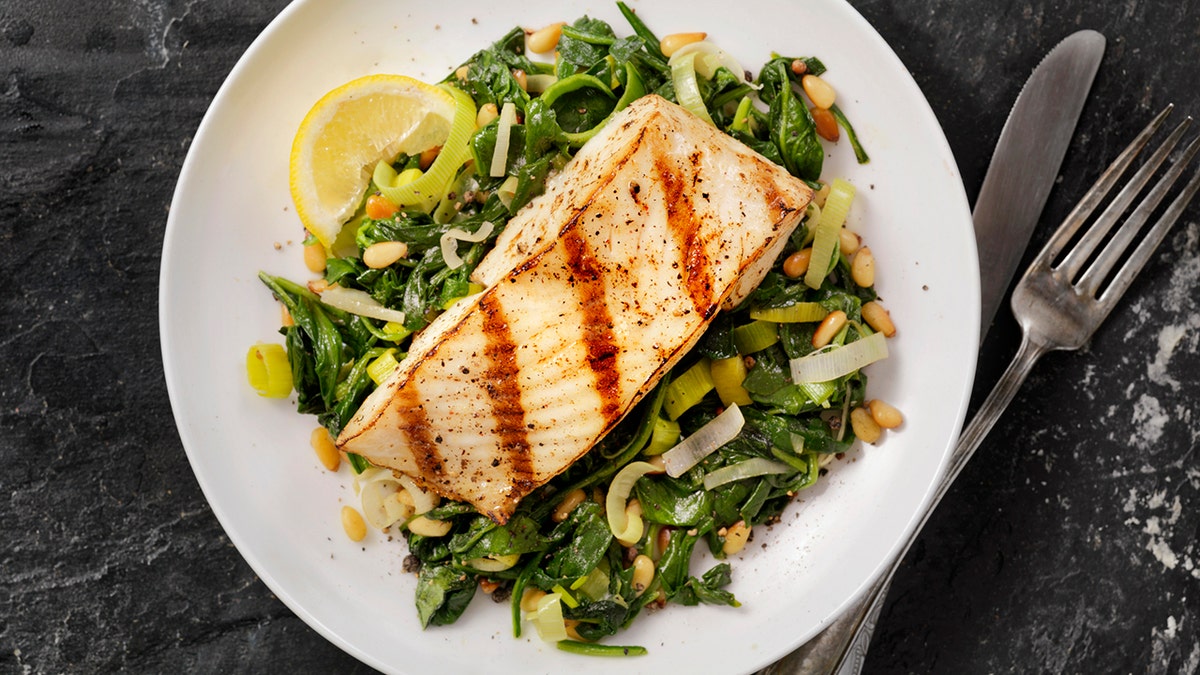 Grilled Halibut with Spinach, leeks and Pine Nuts