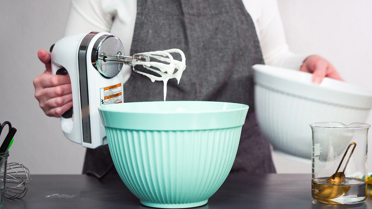 Viral kitchen hack revealing how to use electric hand mixer hands