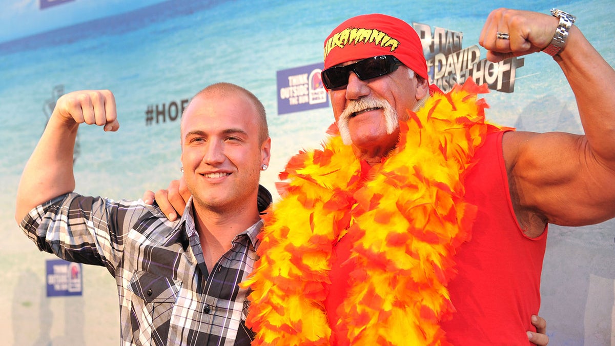 Hulk Hogan and son Nicholas Bollea flex their muscles