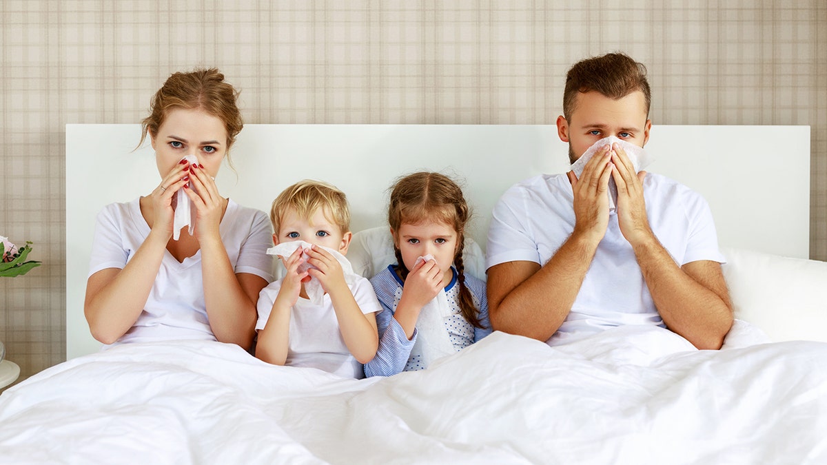 family sick in bed