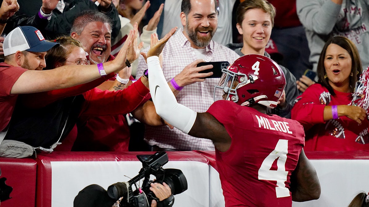 Jalen Milroe celebrates touchdown