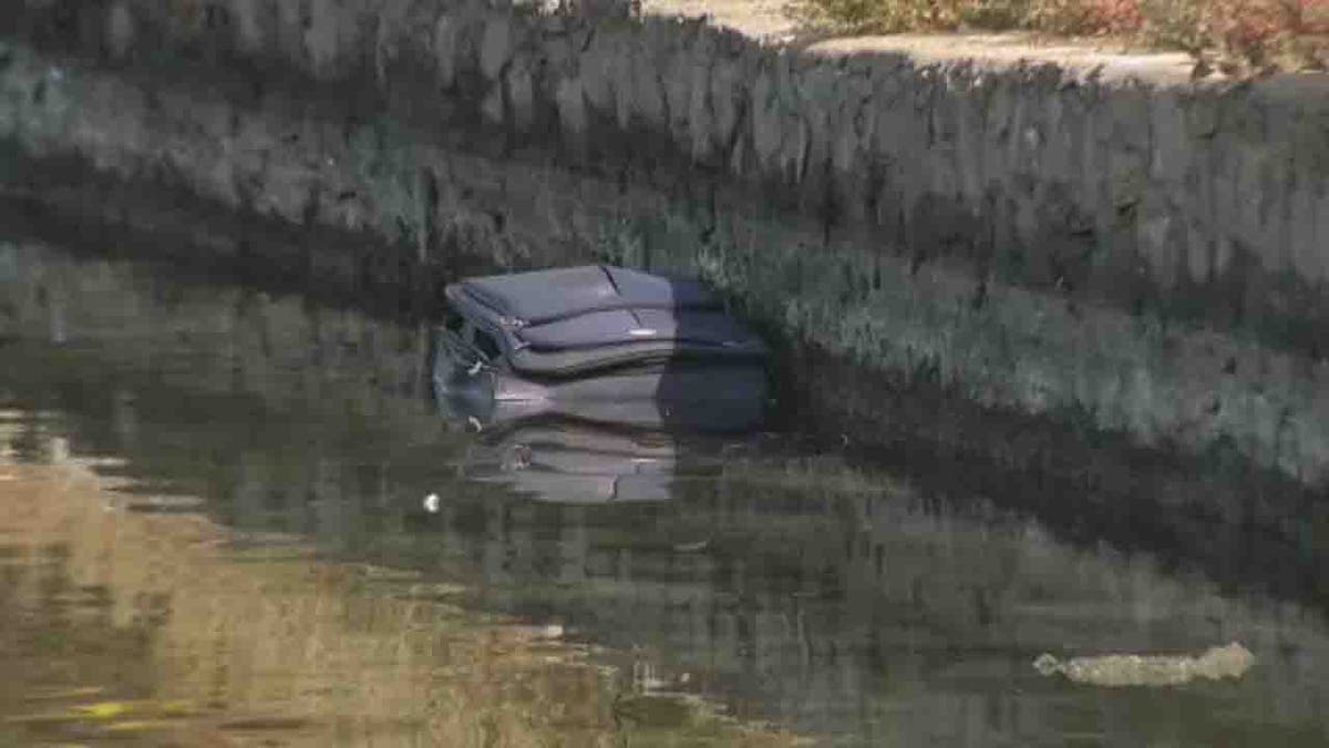 suitcase floating in Lake Merritt