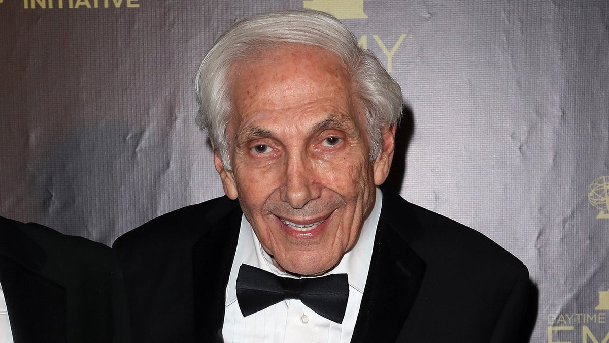 Marty Krofft wears bow tie and black suit at emmy awards