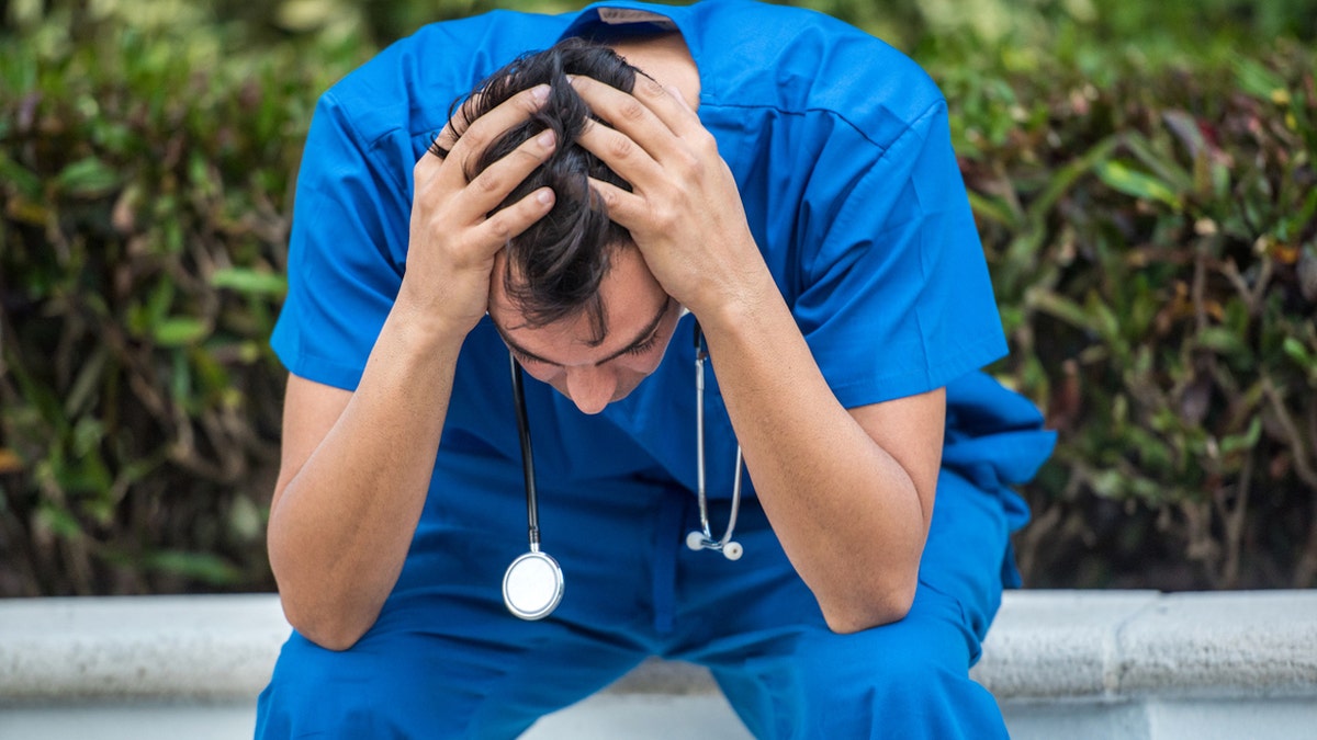 Nurse burnout man