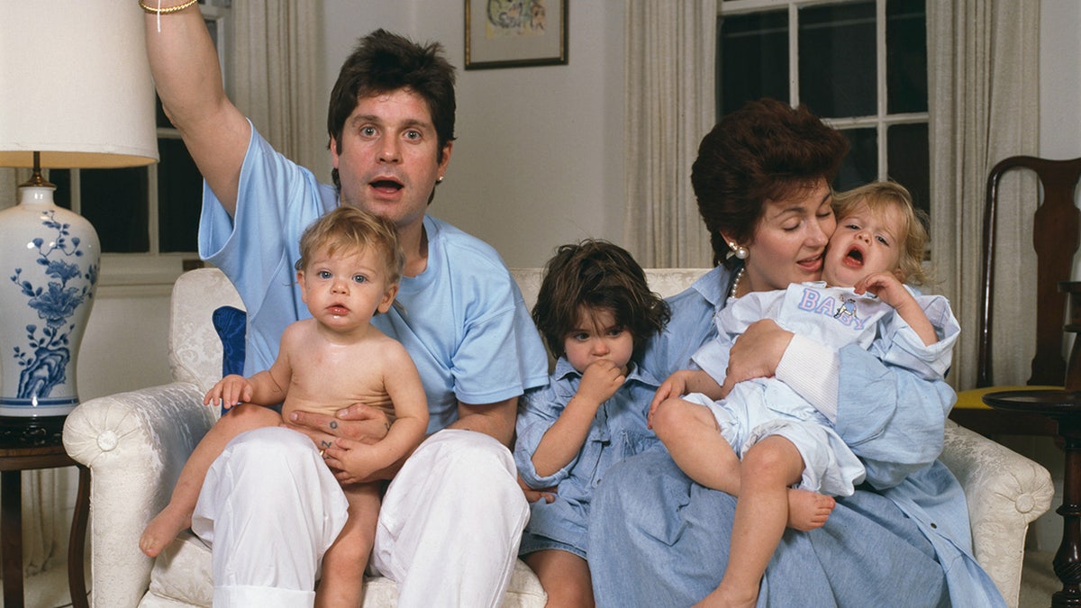 Ozzy and Sharon Osbourne with their kids in 1987