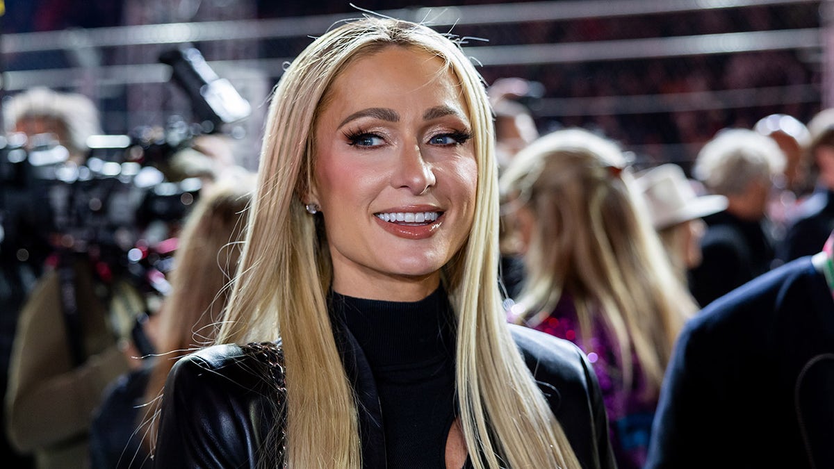 Paris Hilton sports leather jumpsuit at Formula One