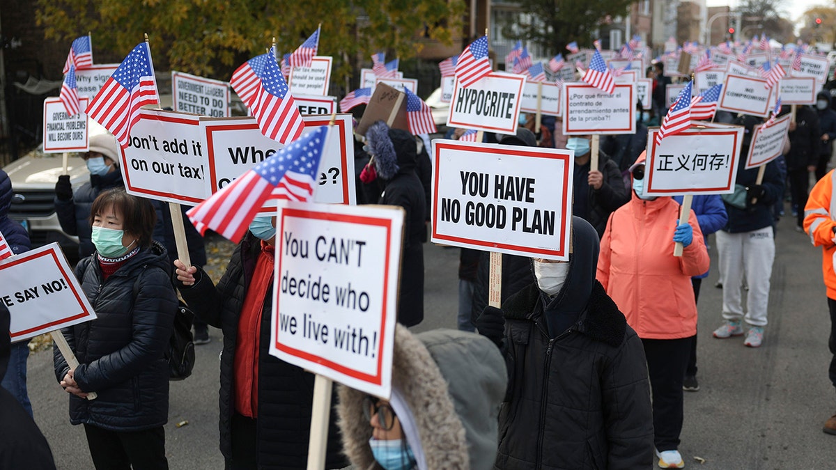 Protesters oppose construction of migrant camp in Brighton Park