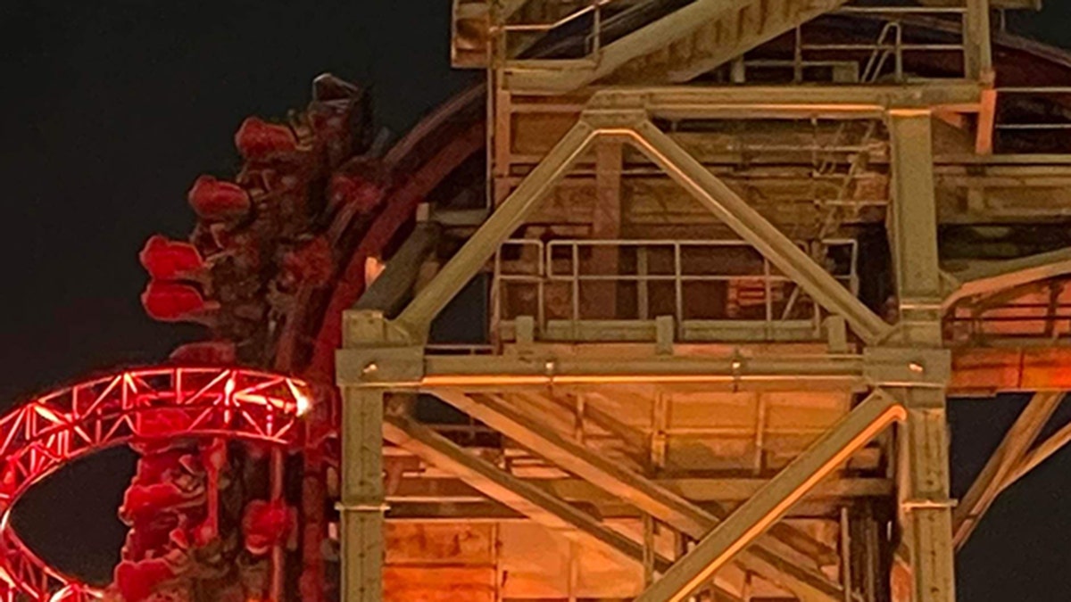 Riders on a Florida roller coaster are seen stuck