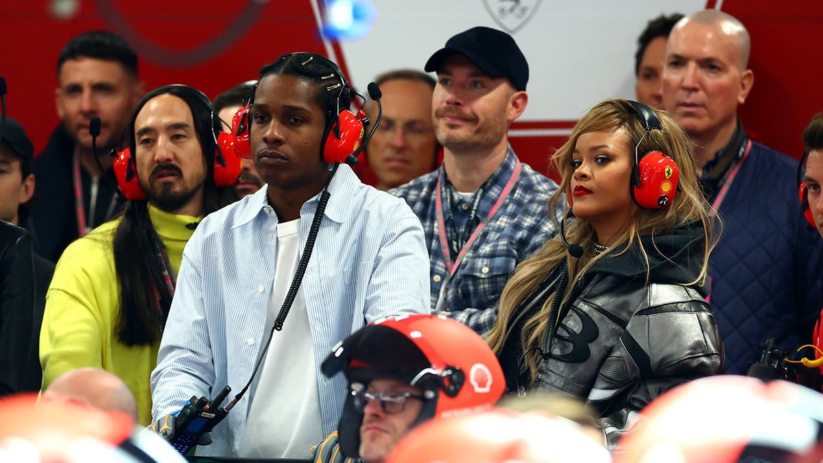 Rihanna and A$AP Rocky look into Ferrari garage at Formula One event
