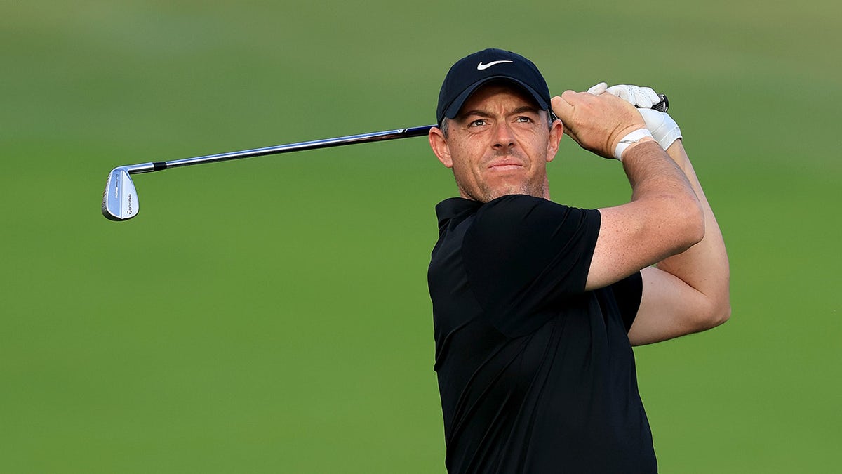 Rory McIlroy plays a shot at a pro-am tour