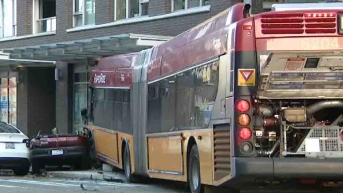 sedan and bus crash