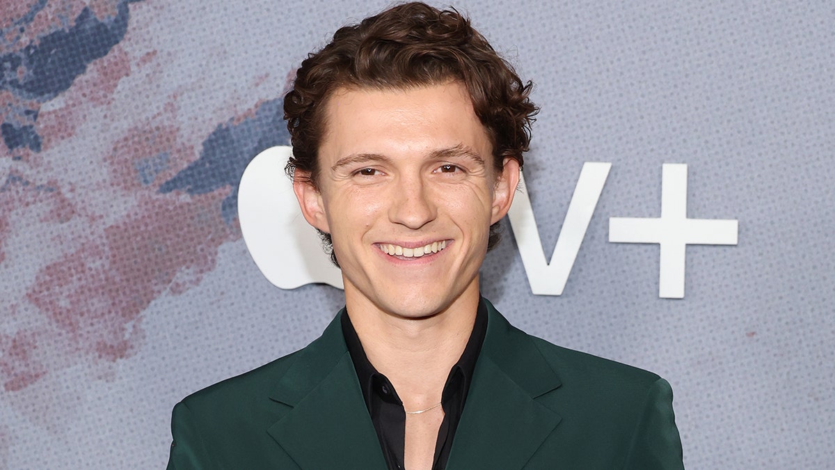Tom Holland at the premiere ot the crowded room