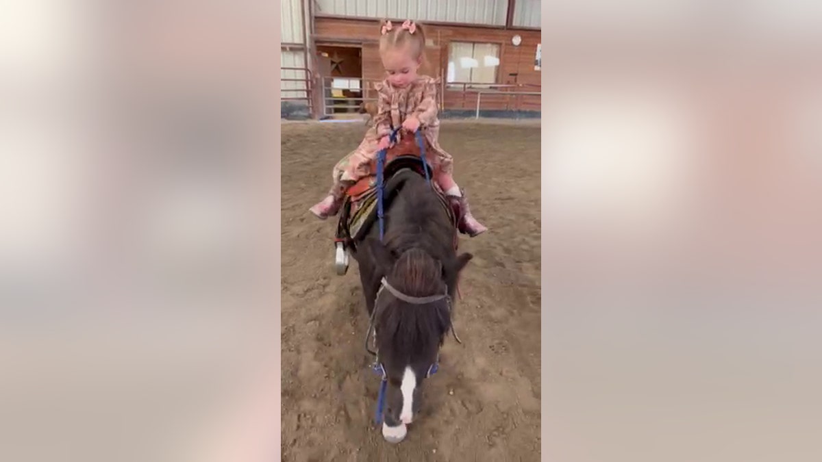 Mayzee Evans riding a horse