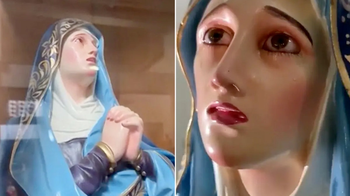 a statue of Mary with tears on it
