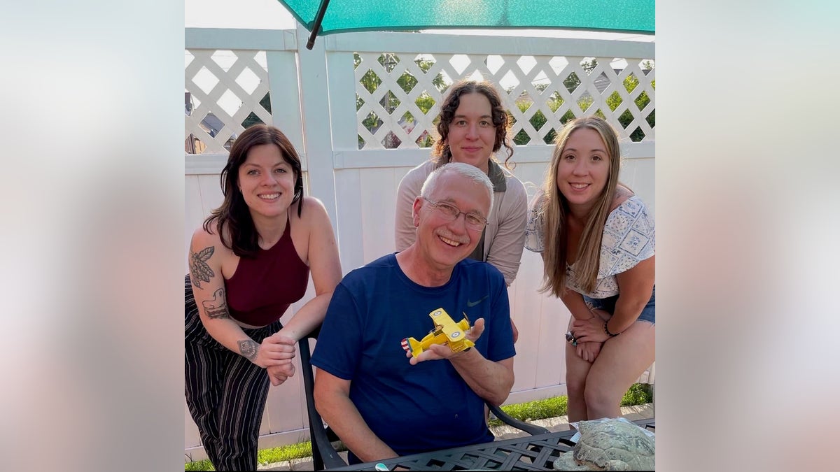 Tristin Kate Smith with dad and sisters