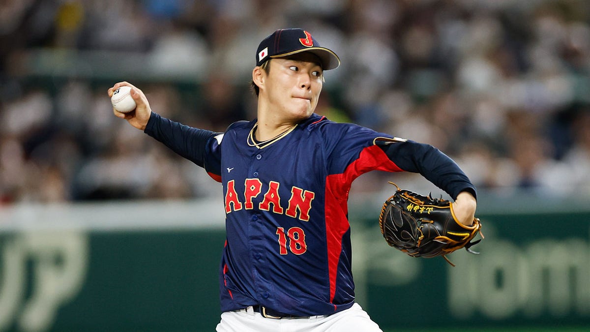Yankees refrained from giving out specific number in order to swoon prized Japanese free agent: report 2 Yoshinobu Yamamoto pitching in Tokyo