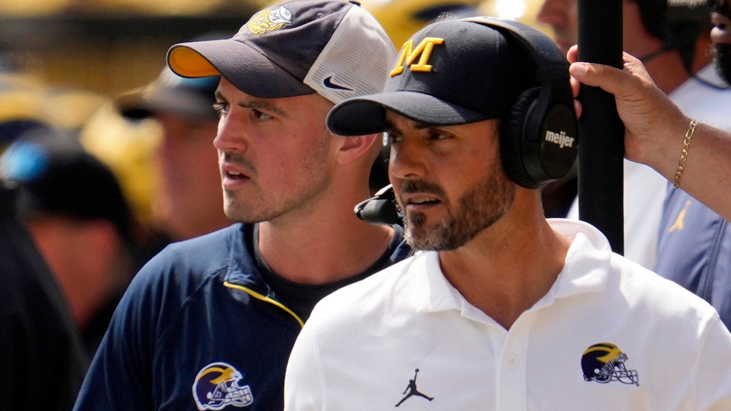 Former Michigan Employee Begins Coaching with Bumpy Start